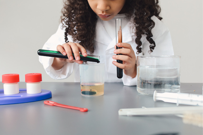 Young student exploring science concepts in the learning lab